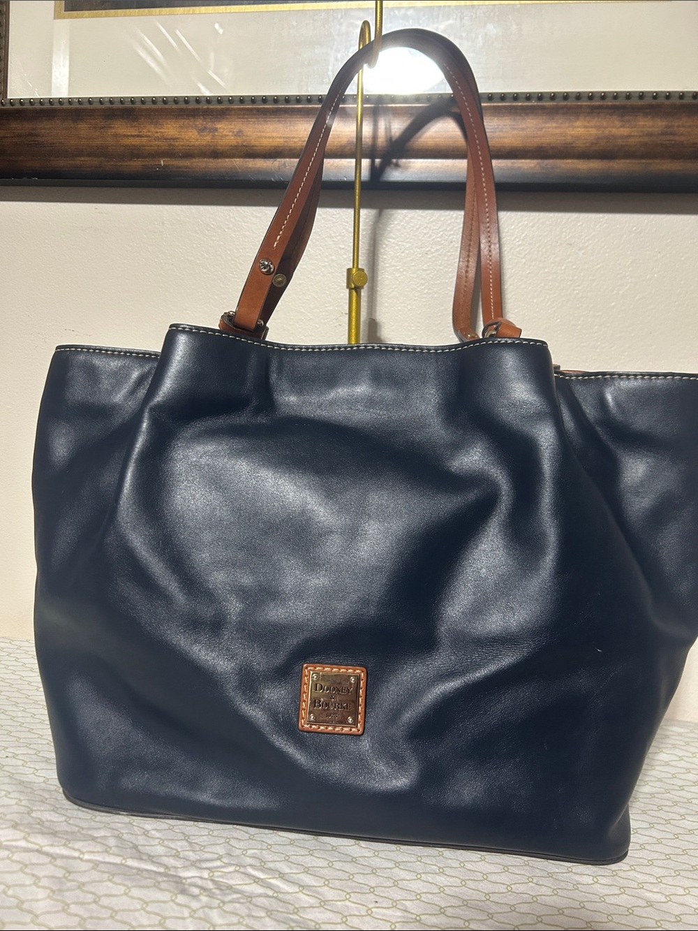 Dooney & Bourke Black Leather Tote with Brown Handles